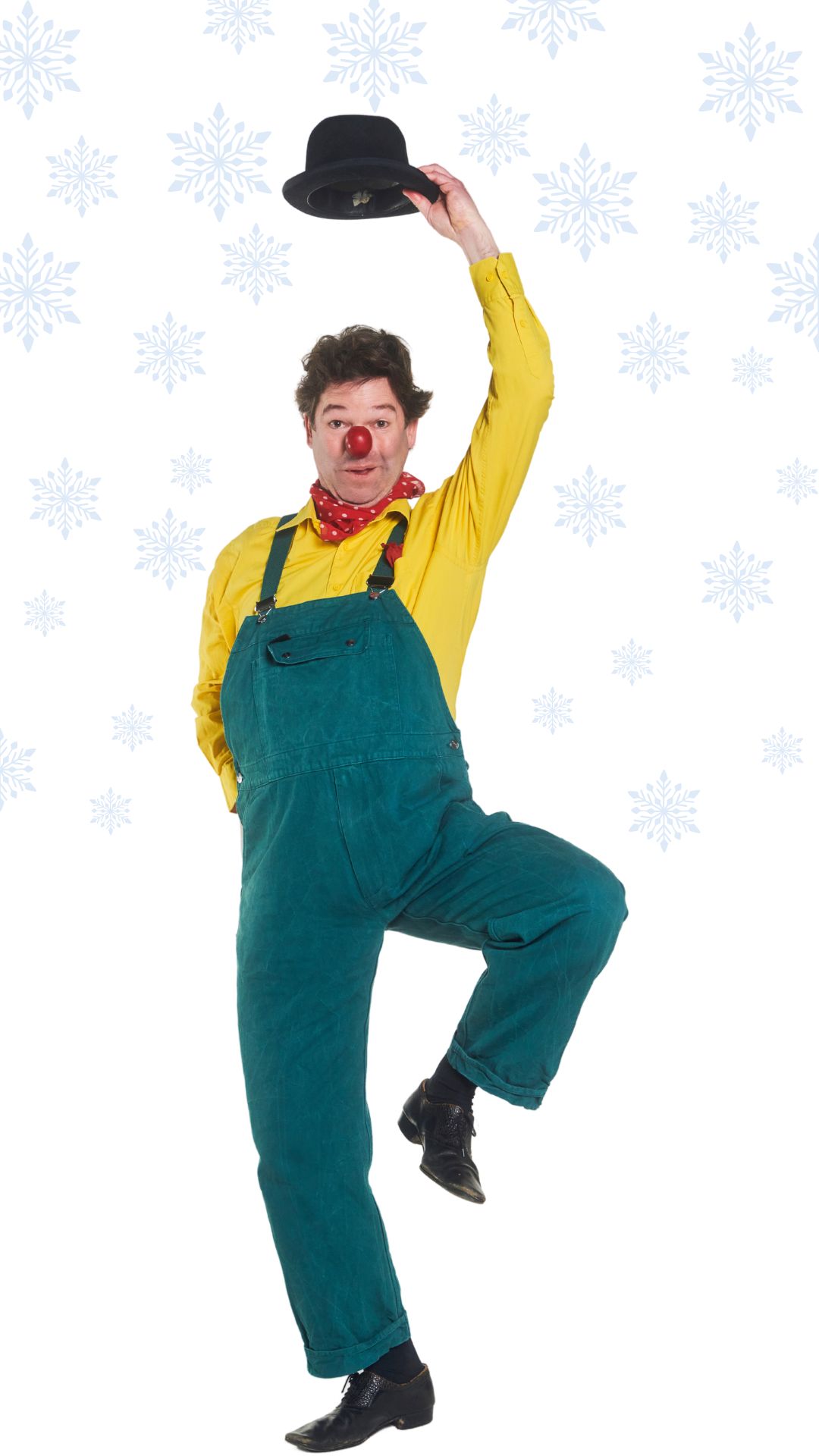Clown Leofino tanzt im fallenden Schnee.